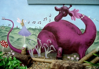 A local artist painted this mural over the new rendered wall at the Kindergarten